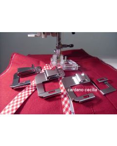 Piedino rotante con guide per orlature e bordature